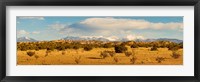High desert plains landscape with snowcapped Sangre de Cristo Mountains in the background, New Mexico Fine Art Print