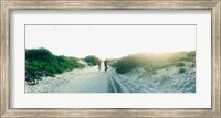 Rear view of a couple cycling along a beach trail, Fort Tilden, Queens, New York City, New York State, USA Fine Art Print