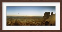 Rock formations on a landscape at sunrise, Cappadocia, Central Anatolia Region, Turkey Fine Art Print