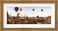 Hot air balloons over landscape at sunrise, Cappadocia, Central Anatolia Region, Turkey Fine Art Print
