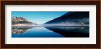 Reflection of a mountain with snowy trees on a lake in winter afternoon, Cote d'Azur, France Fine Art Print