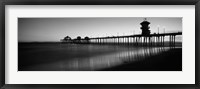 Pier in the sea, Huntington Beach Pier, Huntington Beach, Orange County, California (black and white) Framed Print