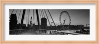 Bridge across a river with a ferris wheel, Golden Jubilee Bridge, Thames River, Millennium Wheel, London, England Fine Art Print