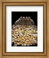 Stack of sliver ingots and pile of coins Fine Art Print