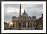 Obelisk in front of the St. Peter's Basilica at sunset, St. Peter's Square, Vatican City Framed Print