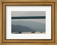 Container ships passing a newly constructed bridge on the Yangtze River, Wanzhou, Chongqing Province, China Fine Art Print