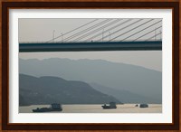 Container ships passing a newly constructed bridge on the Yangtze River, Wanzhou, Chongqing Province, China Fine Art Print