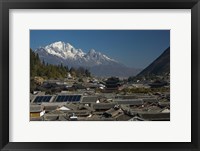 High angle view of houses with Jade Dragon Snow Mountain in the background, Old Town, Lijiang, Yunnan Province, China Fine Art Print