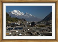 High angle view of houses with Jade Dragon Snow Mountain in the background, Old Town, Lijiang, Yunnan Province, China Fine Art Print