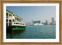 Star ferry on a pier with buildings in the background, Central District, Hong Kong Island, Hong Kong Fine Art Print