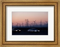 Cars moving on road with wind turbines in background at dusk, Palm Springs, Riverside County, California, USA Fine Art Print