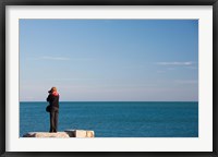 Woman photographing with a camera at Le Cap d' Agde, Herault, Languedoc-Roussillon, France Fine Art Print