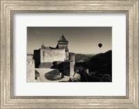 Chateau de Castelnaud with hot air balloon flying over a valley, Castelnaud-la-Chapelle, Dordogne, Aquitaine, France Fine Art Print
