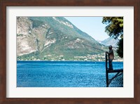 Man Fishing from Dock on Edge of Lake Como, Varenna, Lombardy, Italy Fine Art Print