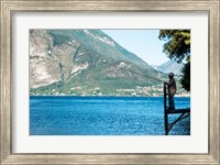 Man Fishing from Dock on Edge of Lake Como, Varenna, Lombardy, Italy Fine Art Print