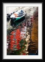 Houses and boat reflected in Lake Como, Varenna, Lombardy, Italy Fine Art Print