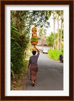 Woman carrying offering to temple, Pejeng Kaja, Tampaksiring, Bali, Indonesia Fine Art Print