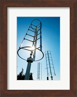 Low angle view of vertical windmills Fine Art Print