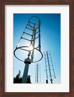 Low angle view of vertical windmills Fine Art Print