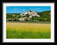 Farm with a town in the background, Simiane-La-Rotonde, Alpes-de-Haute-Provence, Provence-Alpes-Cote d'Azur, France Fine Art Print