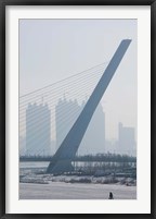 Songhuajiang Highway Bridge across the frozen Songhua River with buildings in the background, Harbin, China Fine Art Print