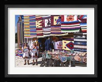 Two female vendors dressed in Mayan costumes displaying products Fine Art Print