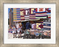 Two female vendors dressed in Mayan costumes displaying products Fine Art Print