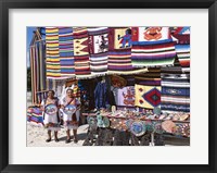 Two female vendors dressed in Mayan costumes displaying products Fine Art Print