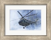 A Bulgarian Air Force Mi-17 helicopter over a forest fire in Bulgaria Fine Art Print