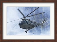 A Bulgarian Air Force Mi-17 helicopter over a forest fire in Bulgaria Fine Art Print