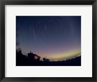 Circumpolar star trails with a faint aurora over horizon, Alberta, Canada Fine Art Print