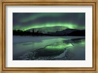 Reflected aurora over a frozen Laksa Lake, Nordland, Norway Fine Art Print