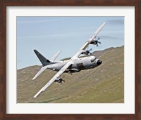 A C-130J Super Hercules low flying over North Wales on a training flight Fine Art Print