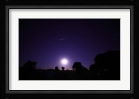 A bolide from the Geminids meteor shower above a setting moon in Mercedes, Argentina Fine Art Print
