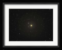 The red giant star Beta Andromedae and its ghost galaxy NGC 404 Fine Art Print