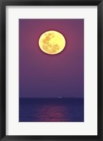 The Thunder's Moon and its reflection above the water Fine Art Print
