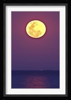 The Thunder's Moon and its reflection above the water Fine Art Print