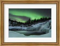 A wintery waterfall and aurora borealis over Tennevik River, Norway Fine Art Print