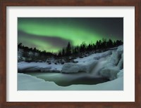 A wintery waterfall and aurora borealis over Tennevik River, Norway Fine Art Print