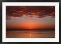 A layer of clouds is lit by the rising sun over Rio de la Plata, Buenos Aires, Argentina Fine Art Print