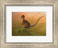 A Sinosauropteryx dinosaur resting on a log Fine Art Print