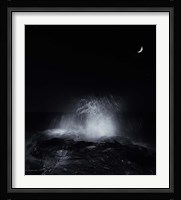 The crescent moon and waves splashing over rocks in Miramar, Argentina Fine Art Print