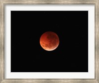 The totality phase of a lunar eclipse during the 2010 solstice Fine Art Print