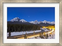 A moonlit nightscape over the Bow River and Morant's Curve in Banff National Park, Canada Fine Art Print