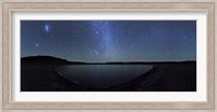 A panoramic view of the Milky Way and La Azul lagoon in Somuncura, Argentina Fine Art Print