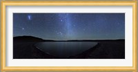 A panoramic view of the Milky Way and La Azul lagoon in Somuncura, Argentina Fine Art Print