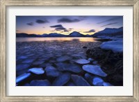 Ice flakes drifting against the sunset in Tjeldsundet strait, Troms County, Norway Fine Art Print
