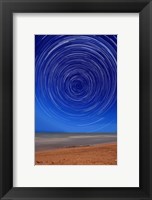 Star trails around the south celestial pole at the beach in Miramar, Argentina Fine Art Print