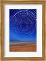 Star trails around the south celestial pole at the beach in Miramar, Argentina Fine Art Print