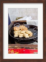 China, Shanghai. Village of Zhujiajiao. Homemade snacks cooked in wok. Fine Art Print